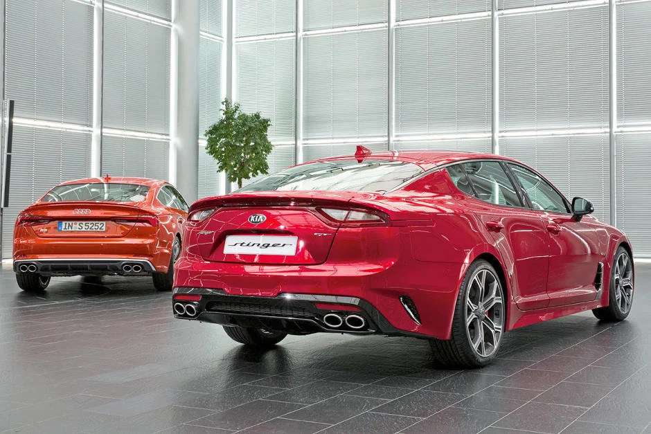 audi-s5-sportback-vs-kia-stinger-24fdd48b3bfb0bd949-940-0-1-95-1.webp