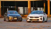 2018-bmw-430i-gran-coupe-vs-2018-kia-stinger-gt.webp