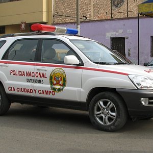 Police_car_Lima-Rímac-Ciudad_y_Campo_Kia_Sportage_JE_Peru.jpg
