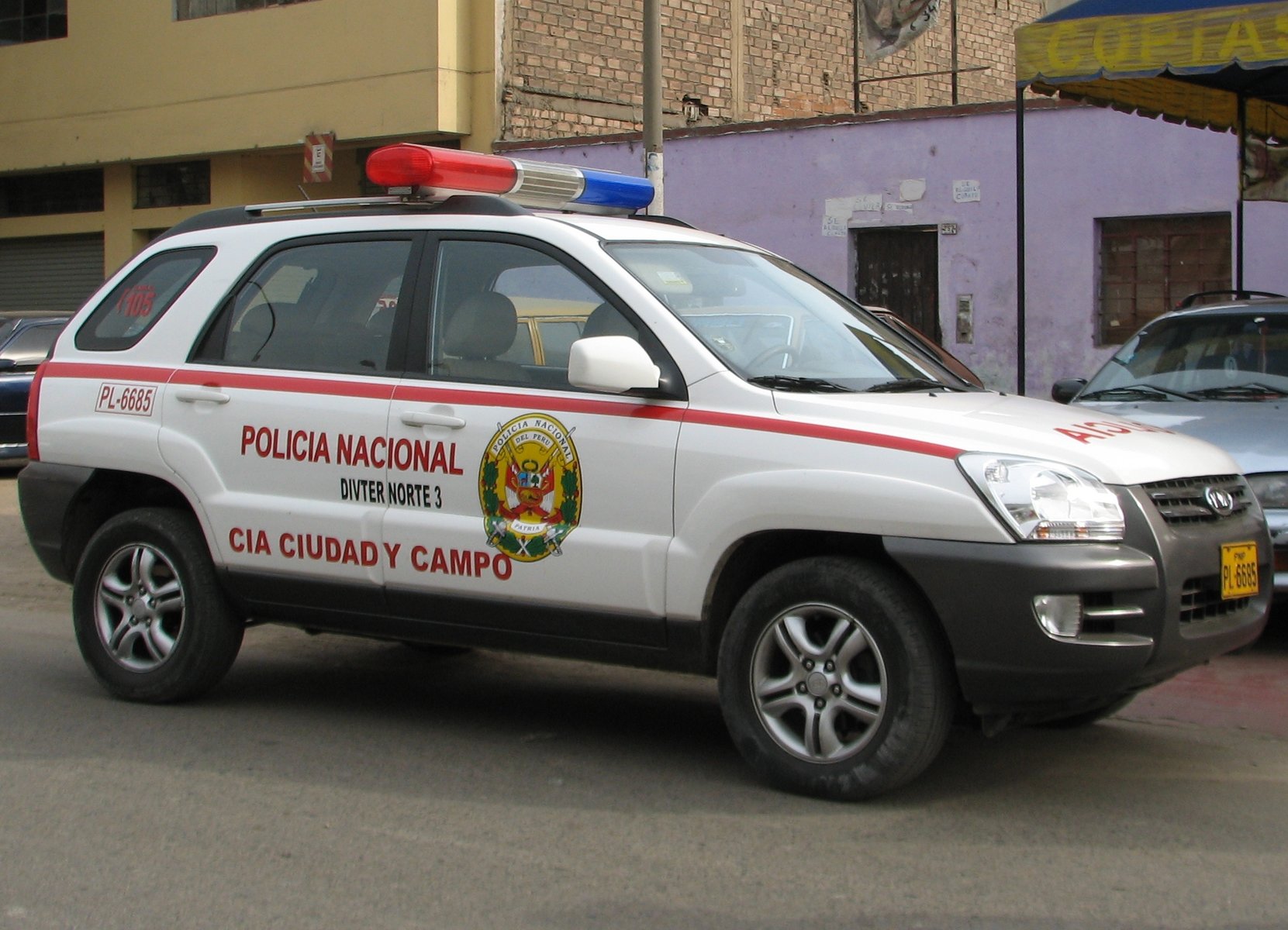 Police_car_Lima-Rímac-Ciudad_y_Campo_Kia_Sportage_JE_Peru.jpg